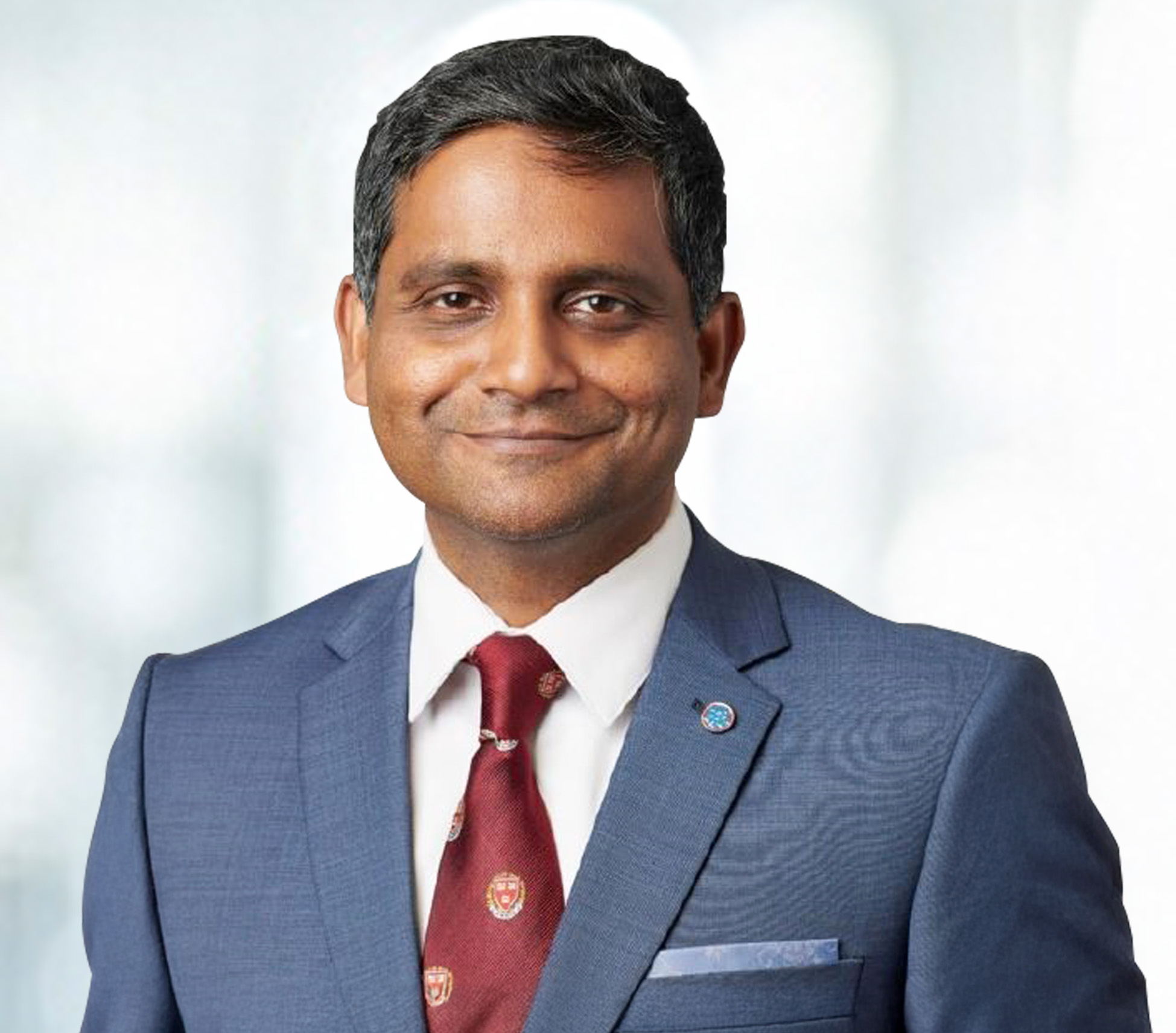 new raj exco headshot.jpg